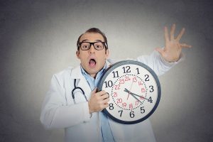 busy overwhelmed doctor who has no time for patients, dysfunctional medical system